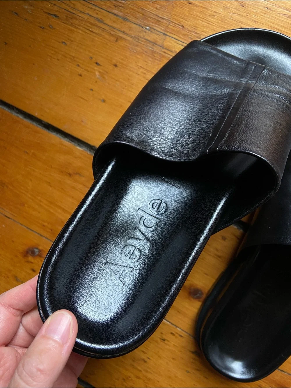 Aeyde black nappa leather slides